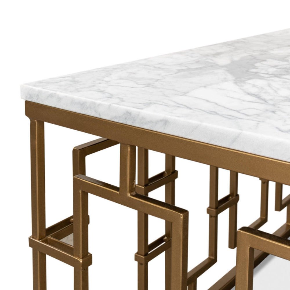 Table with marble top and gold metal frame on a white background