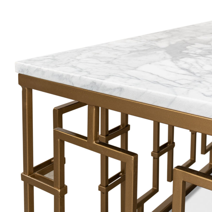 Table with marble top and gold metal frame on a white background